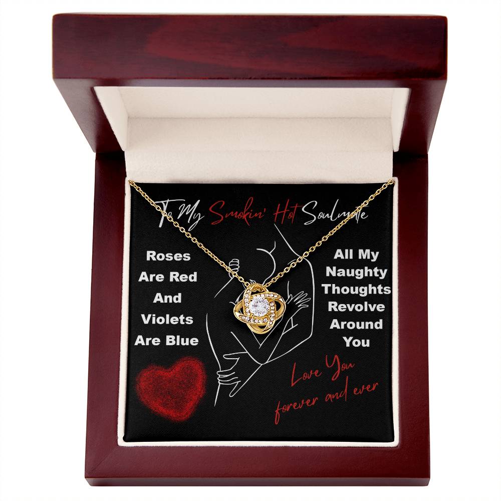 The Soulmate-Around You - Love Knot Necklace is beautifully displayed in a box with romantic lines "Roses are red" and "Love you forever and ever." Made from 14k white gold, it features a cubic zirconia centerpiece, offering a timeless symbol of endless love.