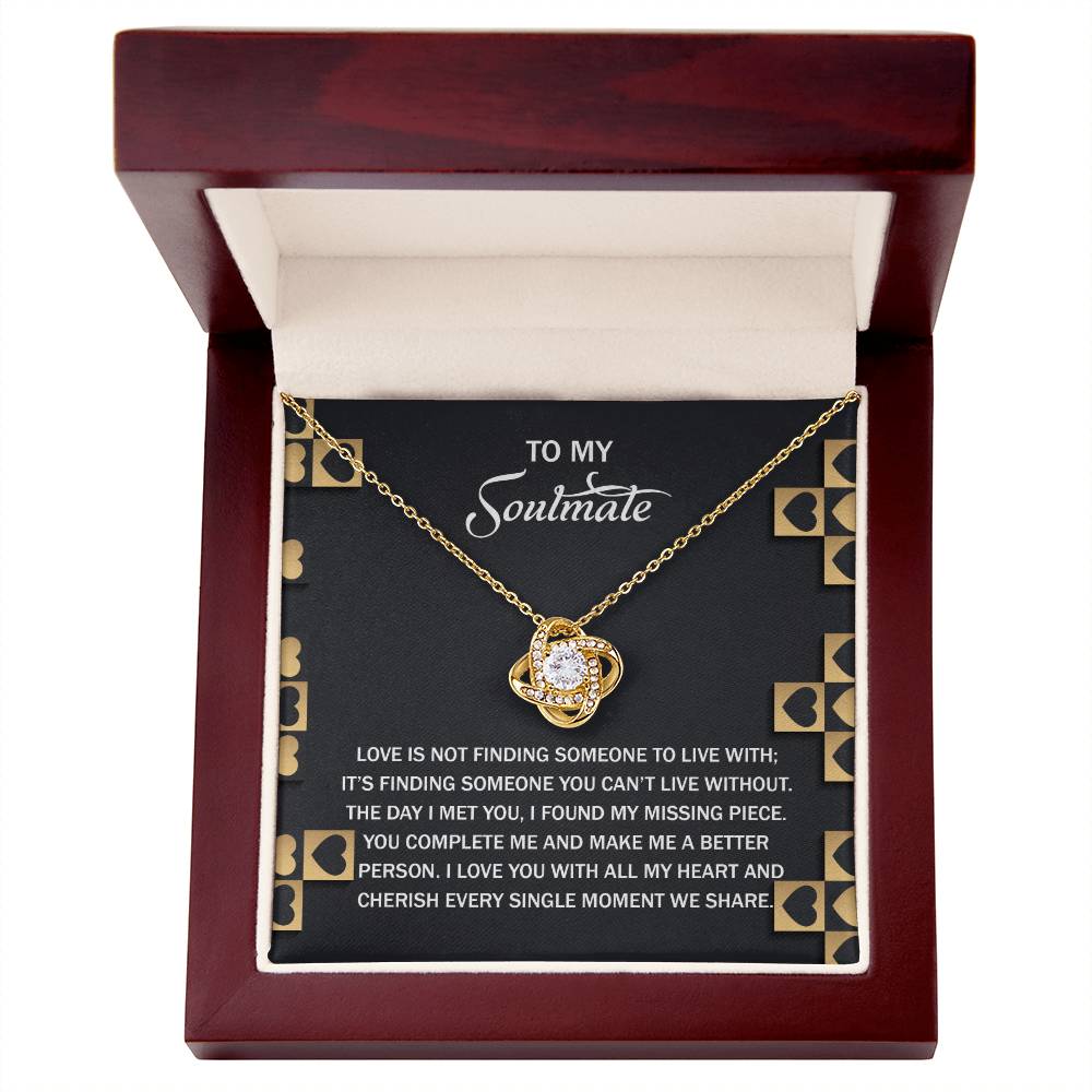 Explore the Soulmate-Missing Piece Love Knot Necklace, a stunning piece with a central gem and sparkling cubic zirconia crystals. It comes in a beautiful box with a heartfelt message about love and soulmates, available in white or yellow gold finish—ideal as an eternal connection symbol.
