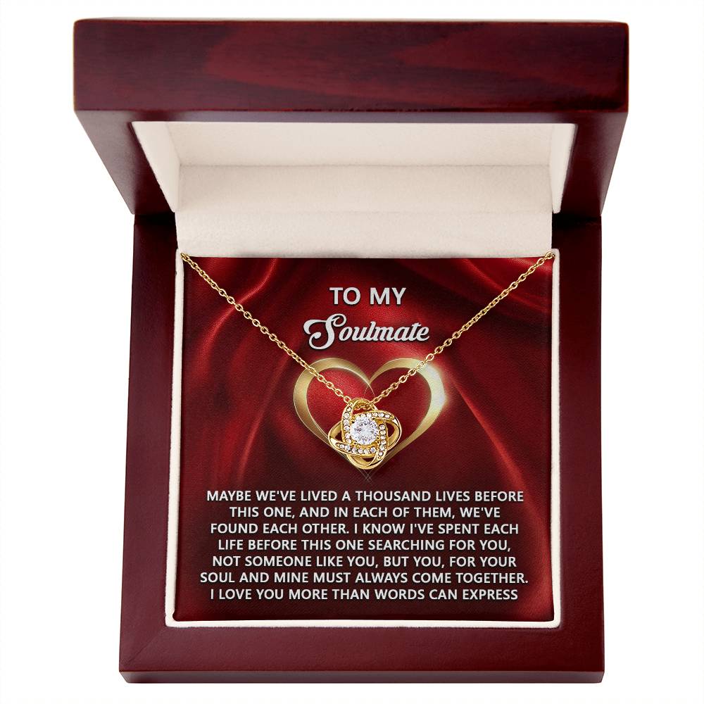 The Soulmate-Your Soul - Love Knot Necklace features a heart-shaped pendant with cubic zirconia accents, nestled in a wooden box. It includes the message "To My Soulmate," making it the perfect personalized gift to express your love.