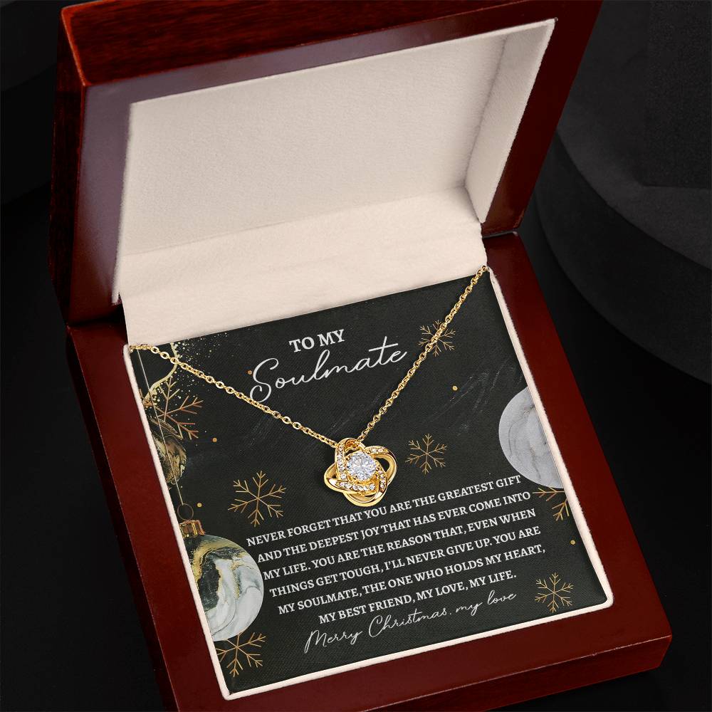 Present a personalized gift to your soulmate with the Soulmate-Greatest Gift - Love Knot Necklace, elegantly placed in a wooden box accompanied by a heartfelt message card that reads, "To my soulmate, never forget that you are the greatest gift... Merry Christmas, my love.