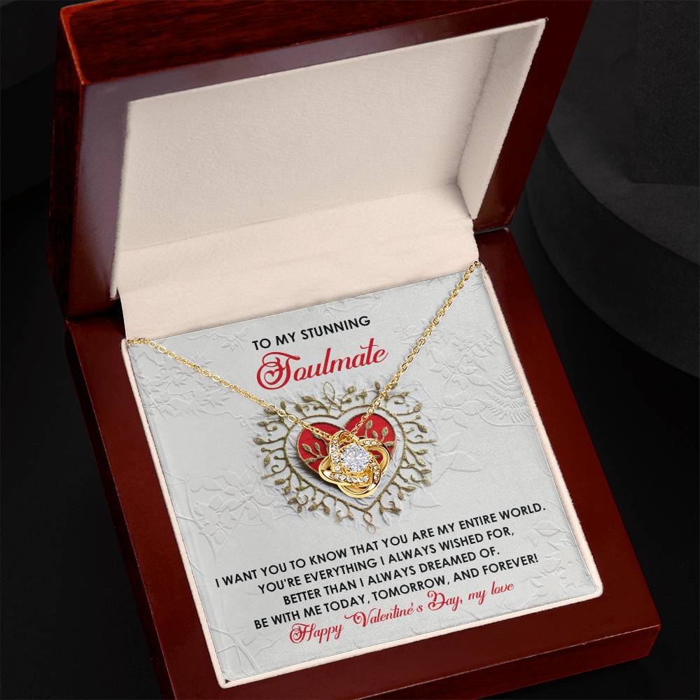 The Soulmate-Be With Me Love Knot Necklace features intertwined hearts with cubic zirconia crystals, presented in a velvet box with a message for your "soulmate," expressing love and commitment, ideal as a personalized gift.