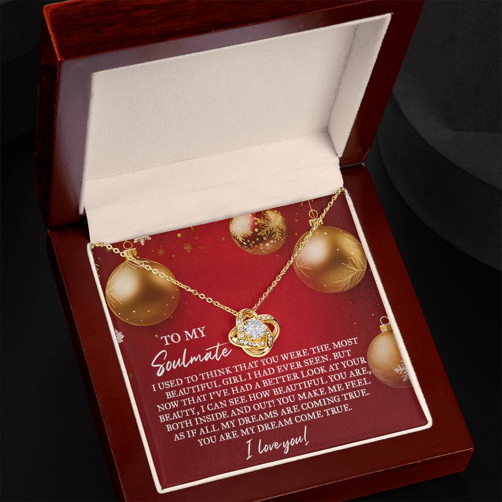 The Soulmate-Your Beauty - Love Knot Necklace, nestled in a jewelry box and adorned with cubic zirconia crystals, accompanied by a heartfelt card featuring ornamental designs, makes the perfect personalized gift.