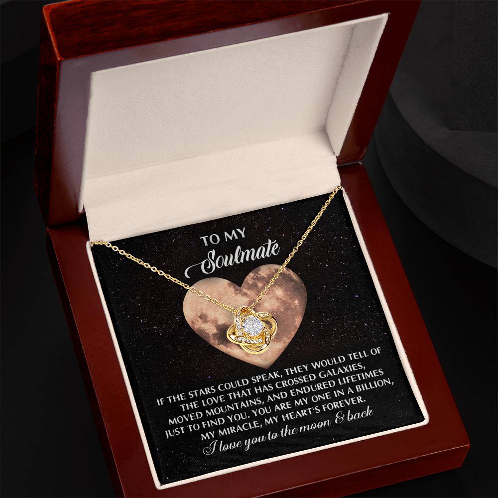 The Soulmate-Crossed Galaxies - Love Knot Necklace, adorned with cubic zirconia crystals, comes in a box with a heartfelt message card featuring a moon-themed background, perfect for your soulmate.