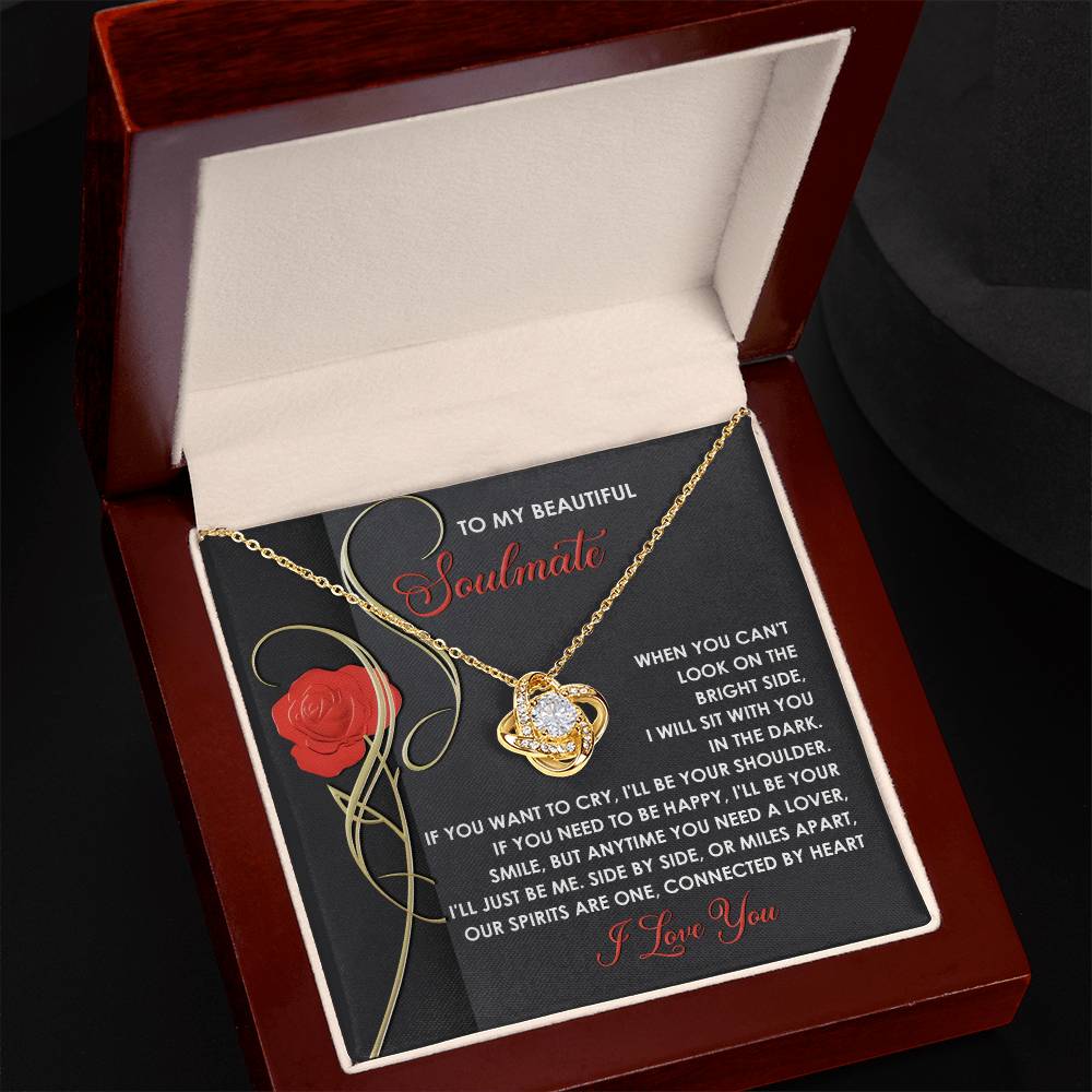 The Soulmate-Be Me - Love Knot Necklace comes in a box with a message card, embellished with cubic zirconia crystals and a rose design, featuring heartfelt text for your soulmate.