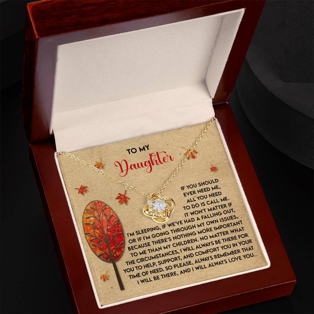 This thoughtful personalized gift is the Daughter-Always Love You - Love Knot Necklace, featuring cubic zirconia crystals in a heart and crystal pendant. It comes beautifully packaged in a message gift box decorated with autumn leaves, making it the perfect expression of love for a cherished daughter.