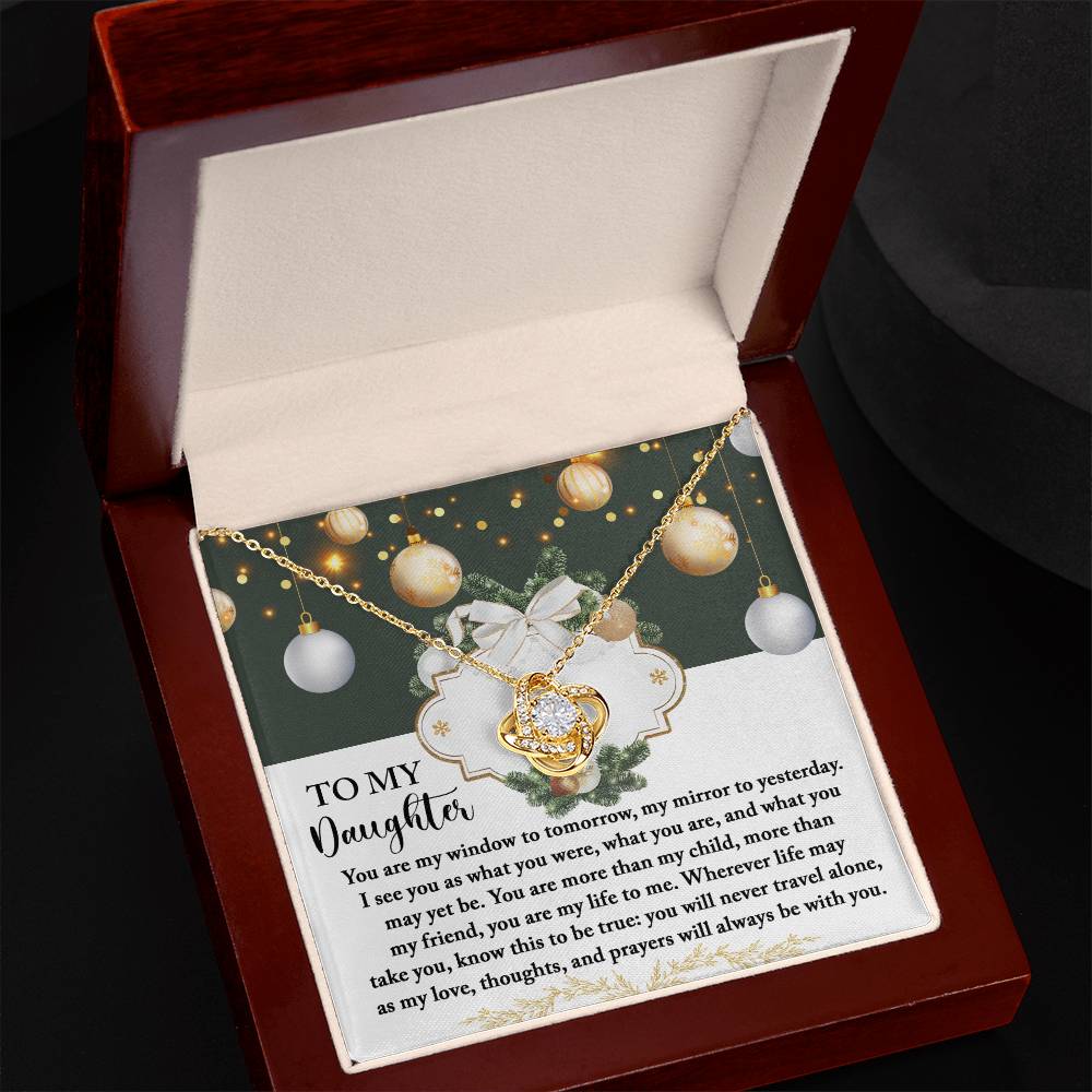 The Daughter-My Mirror - Love Knot Necklace, presented in a charming gift box, showcases cubic zirconia crystals alongside a touching message dedicated to a daughter. Adorned with decorative ornaments and a bow, it serves as an ideal personalized gift.
