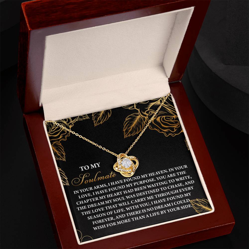 The Soulmate-By Your Side Love Knot Necklace features a heart and cubic zirconia pendant, shining in a velvet-lined box, paired with a romantic note for your soulmate.
