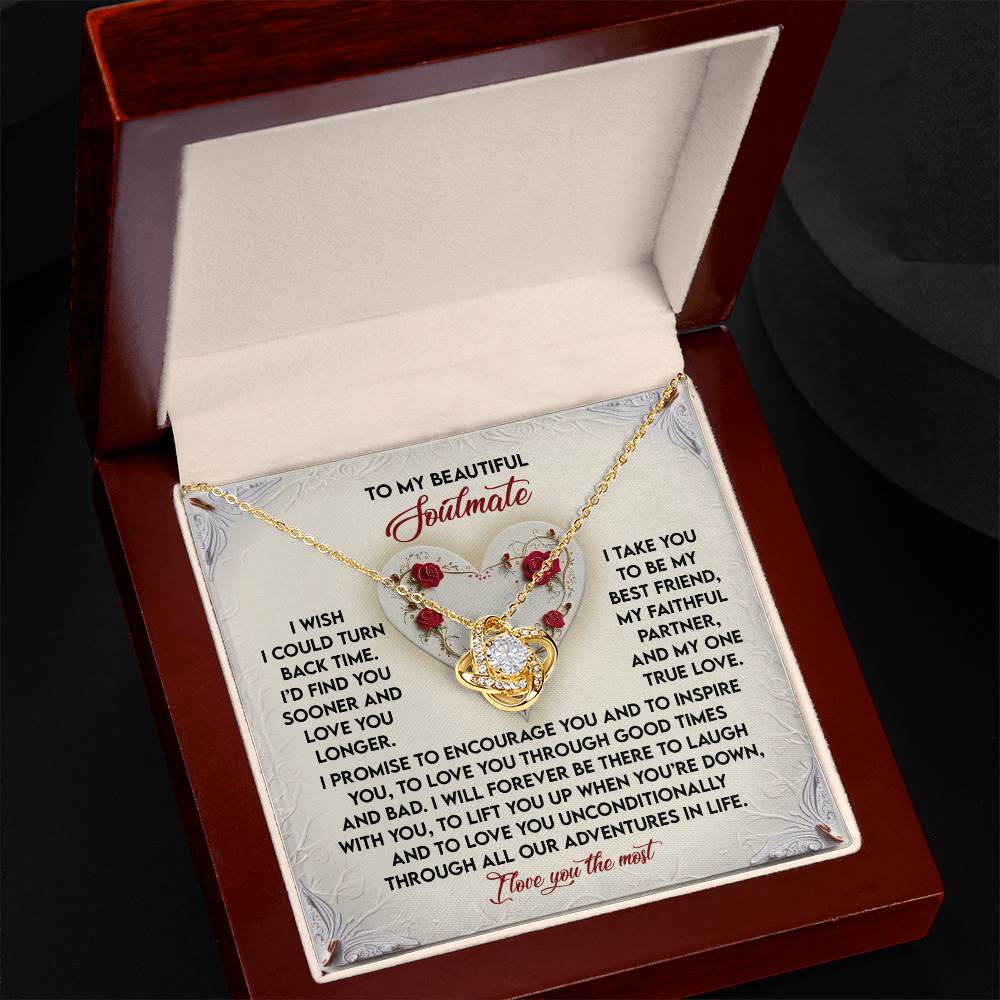 The Soulmate-Laugh With You - Love Knot Necklace, featuring sparkling cubic zirconia crystals, is presented in a gift box with a heartfelt "soulmate" message, symbolizing love and support.