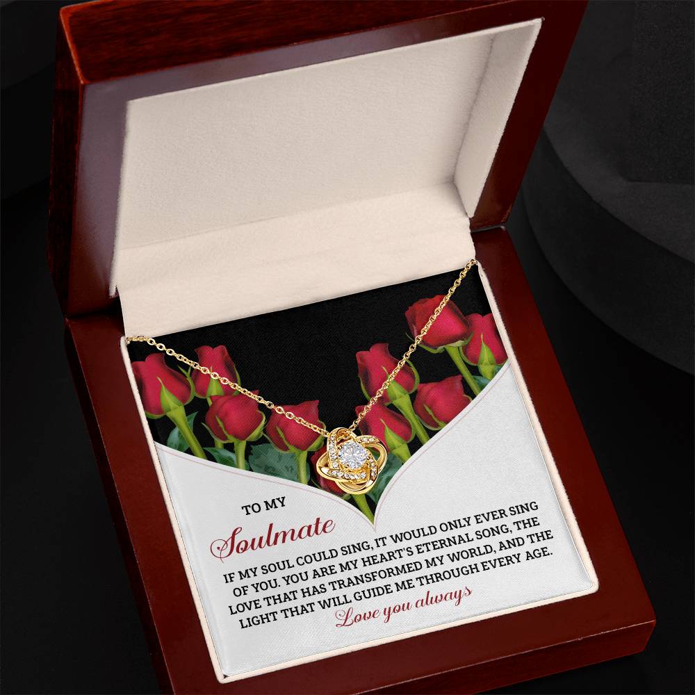 The Soulmate-Eternal Song - Love Knot Necklace, a beautiful personalized gift, rests elegantly in a jewelry box. Inside the lid, a romantic message reads: "To my soulmate...Love you always," capturing eternal affection.