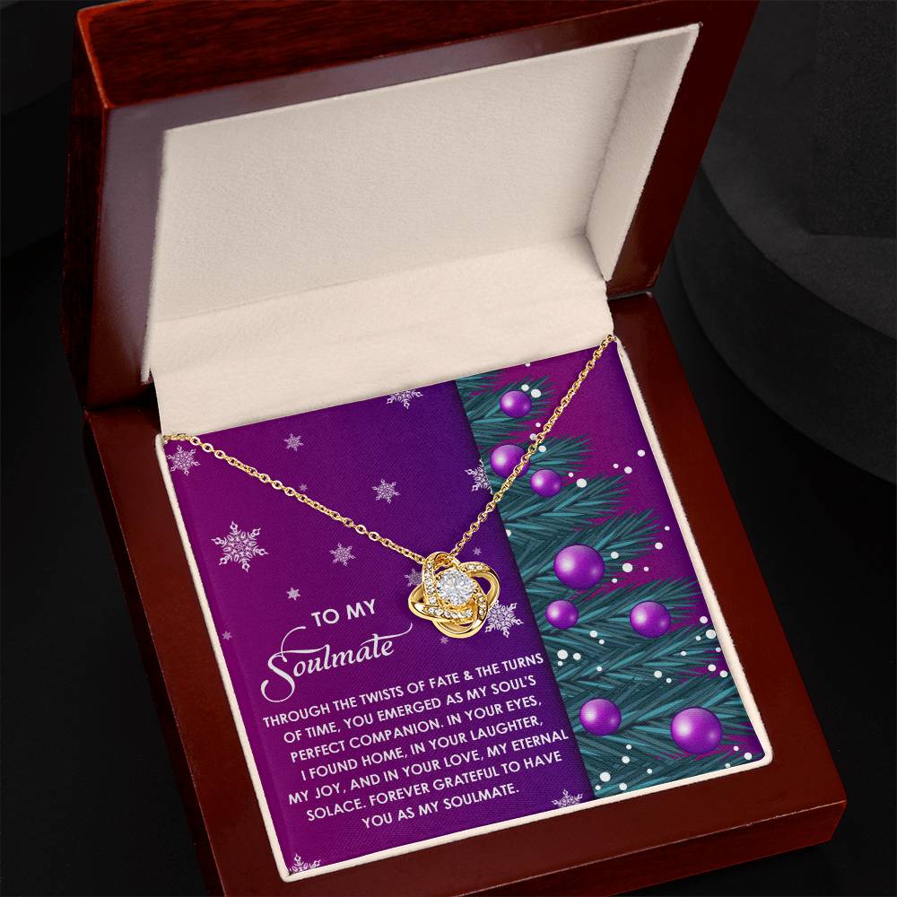 The Soulmate-Perfect Companion - Love Knot Necklace, nestled in a box featuring a heartfelt message on a purple and green decorative background, makes the perfect personalized gift.