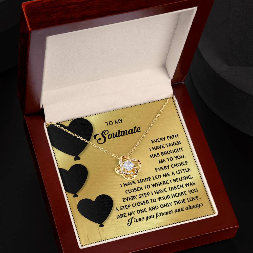 The Soulmate-A Step Closer - Love Knot Necklace features sparkling cubic zirconia crystals and comes in a red box with a romantic message inside the lid, making it the perfect personalized gift for celebrating your special connection.