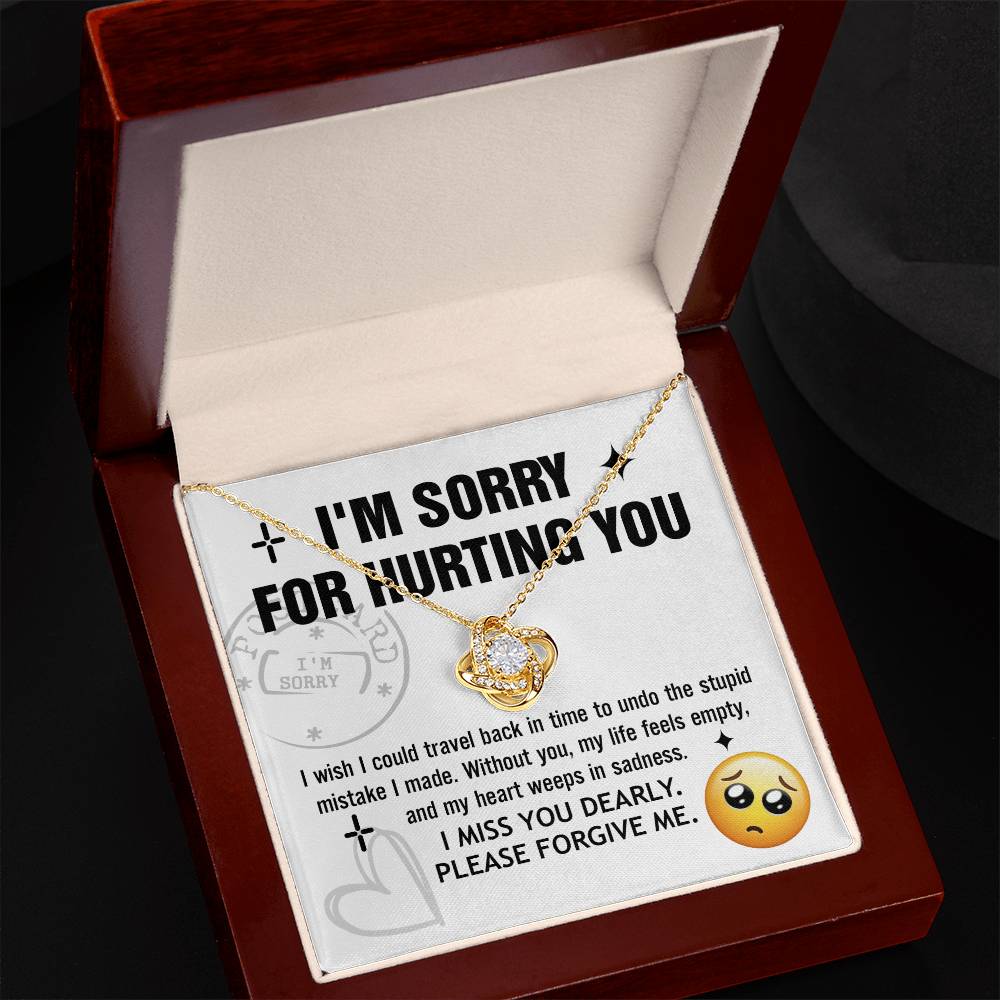 The Sorry-Travel Back Love Knot Necklace comes in a beautiful box with a heartfelt apology message that reads, "I'm sorry for hurting you. I miss you dearly. Please forgive me," adorned with cubic zirconia crystals and accompanied by an emoji with pleading eyes – the perfect personalized gift to mend hearts.