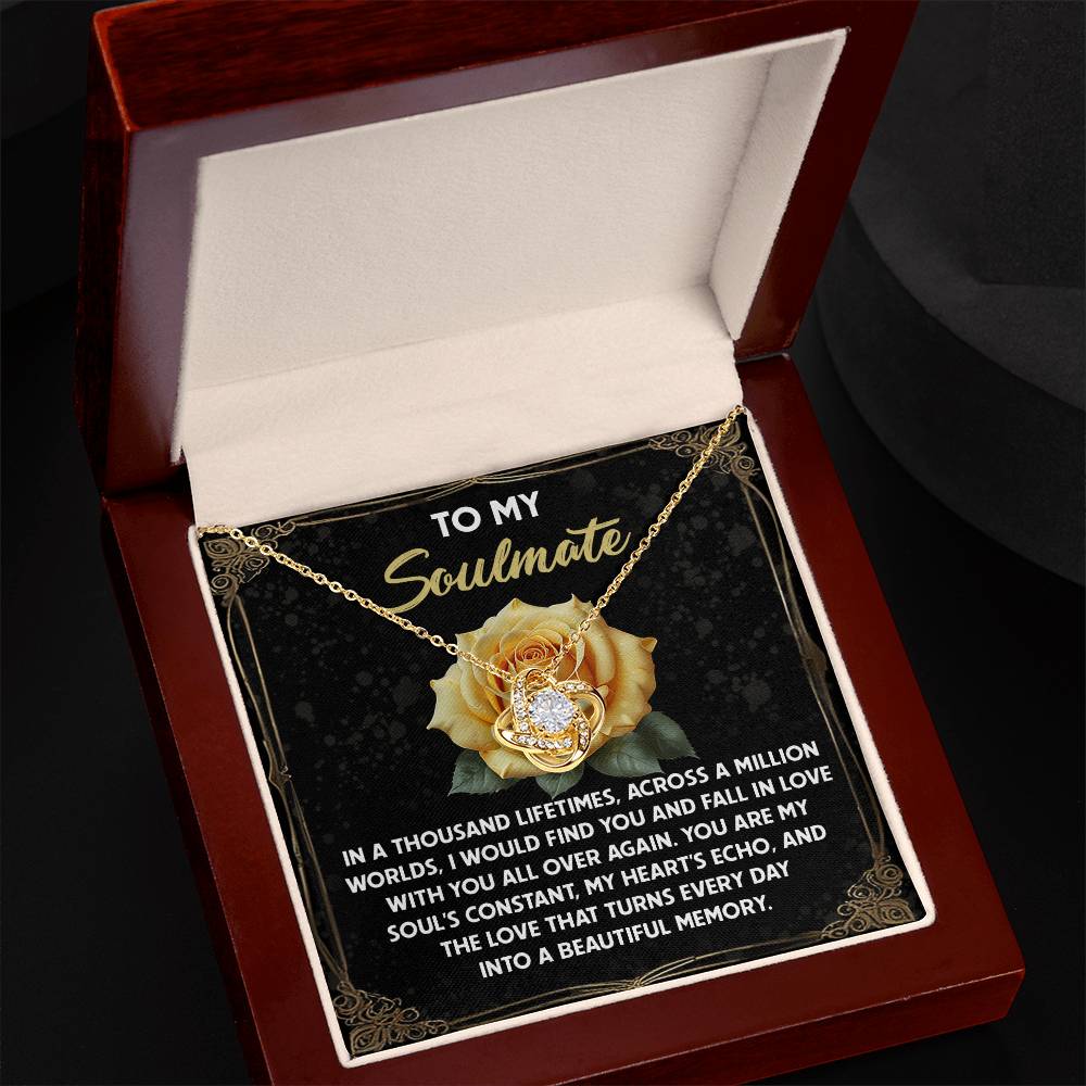 The Soulmate-Beautiful Memory Love Knot Necklace, adorned with cubic zirconia crystals, is showcased in a jewelry box against a "To My Soulmate" card featuring a touching message and rose image—perfect as a personalized gift for someone special.