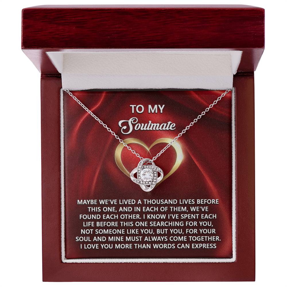 The Soulmate-Your Soul Love Knot Necklace, presented in a wooden box that reads "To My Soulmate," includes a heartfelt message. This personalized gift elegantly symbolizes eternal love with its cubic zirconia centerpiece, making it perfect for expressing deep emotions.