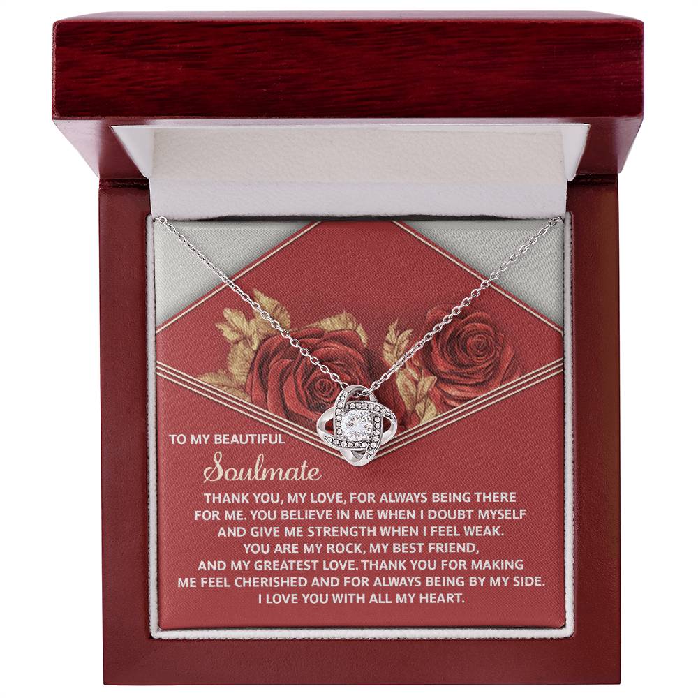 The Soulmate-All My Heart - Love Knot Necklace showcases a heart pendant with cubic zirconia crystals, presented in a red box adorned with roses and a romantic inner lid message.