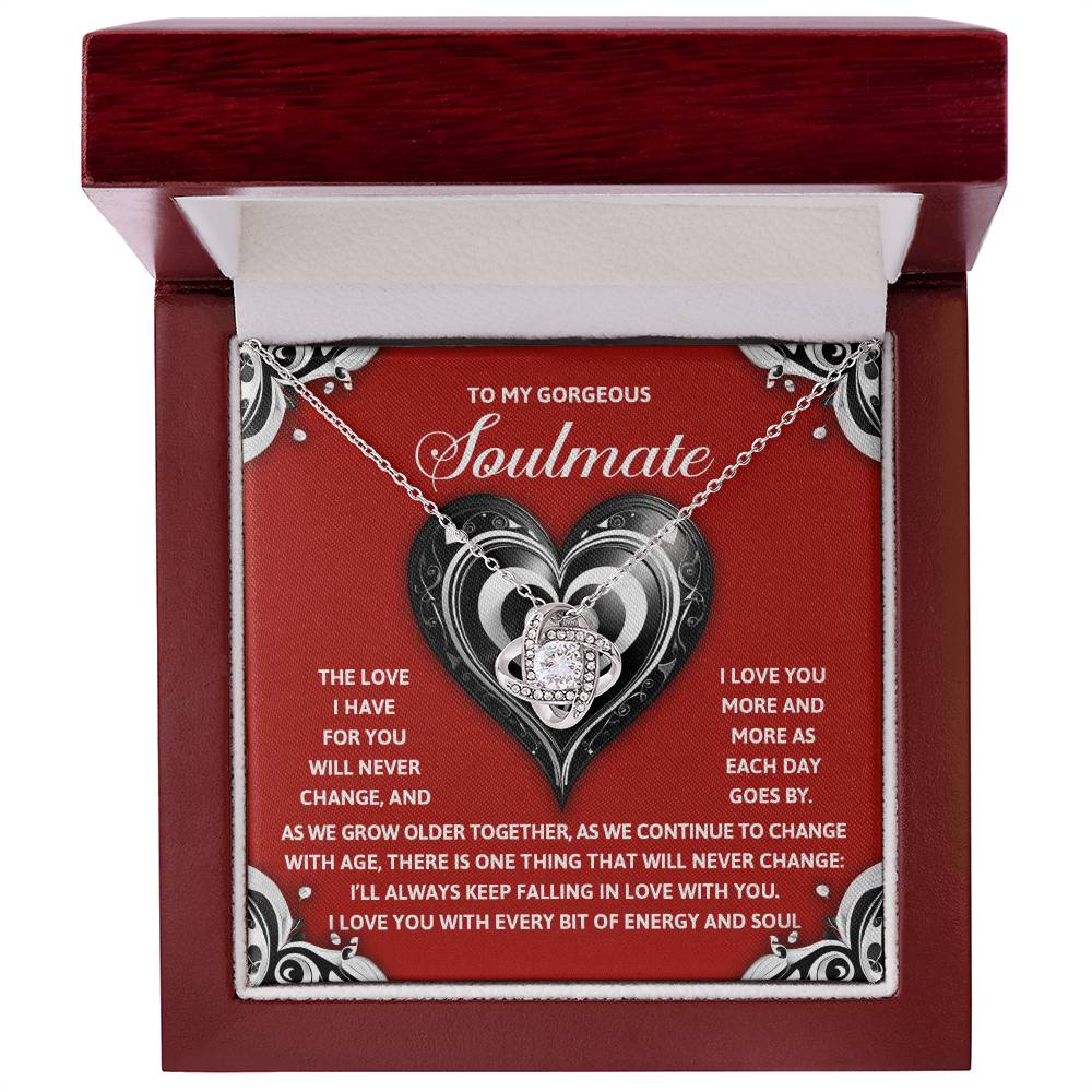 Gift your soulmate the Soulmate-Energy And Soul Love Knot Necklace, featuring a stunning heart-shaped pendant adorned with cubic zirconia, nestled beautifully in a jewelry box. This personalized piece perfectly conveys your romantic message.