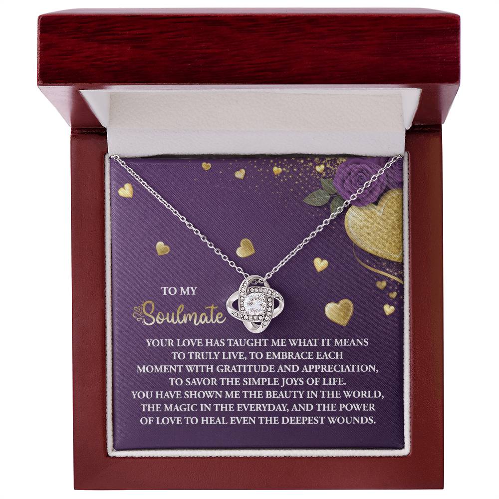 The Soulmate-Joys Of Life - Love Knot Necklace, set in a chic box with a planet pendant, features a heartfelt message of love, gratitude, appreciation, and healing. Adorned with gold and purple elements, it makes the perfect personalized gift.