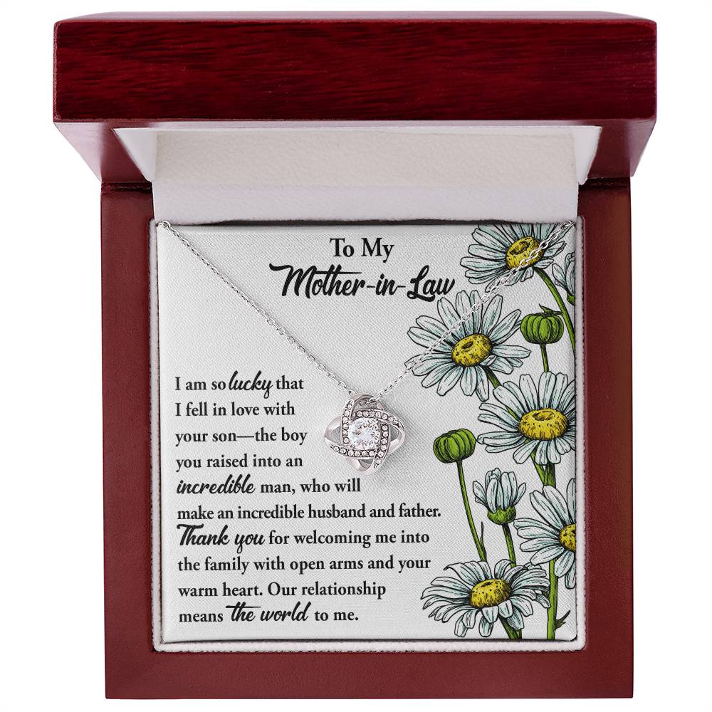 To Mother-In-Law, Warm Heart - Love Knot Necklace on a floral card with a heartfelt message to a mother-in-law, expressing gratitude and affection.