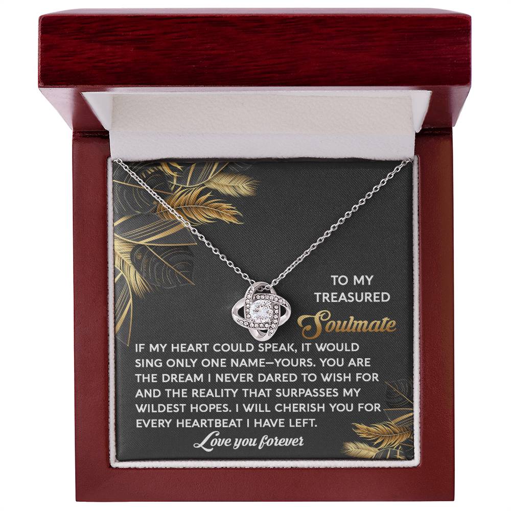 The Soulmate-Wildest Hopes Love Knot Necklace features cubic zirconia and arrives in a red box. Inside the lid reads: "To my treasured soulmate" with a heartfelt message, making it the ideal personalized gift for someone you cherish.