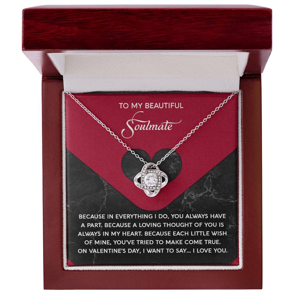 The Soulmate-Loving Thought Love Knot Necklace, adorned with cubic zirconia crystals, is presented in a red gift box with a heartfelt soulmate dedication, making it the perfect personalized gift.