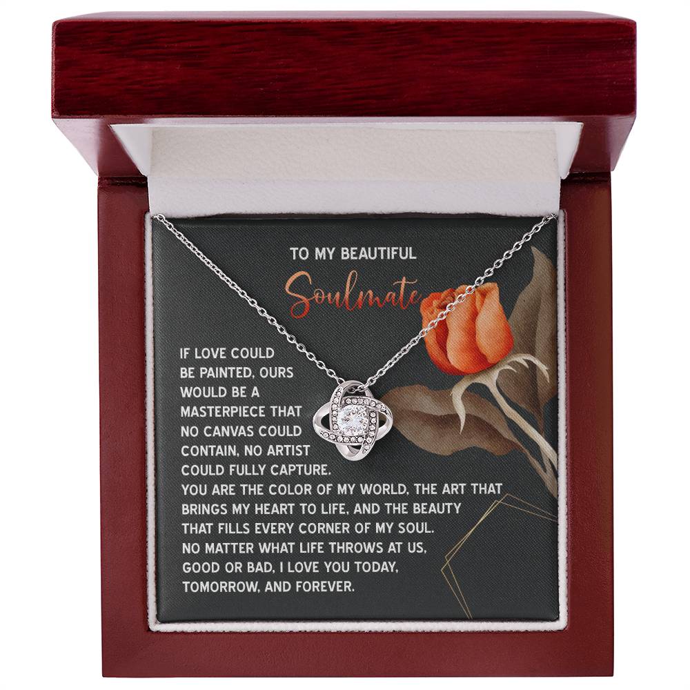 The Soulmate-A Masterpiece - Love Knot Necklace features sparkling cubic zirconia crystals and comes in a wooden jewelry box with a card expressing the unbreakable bond of love and artistry.