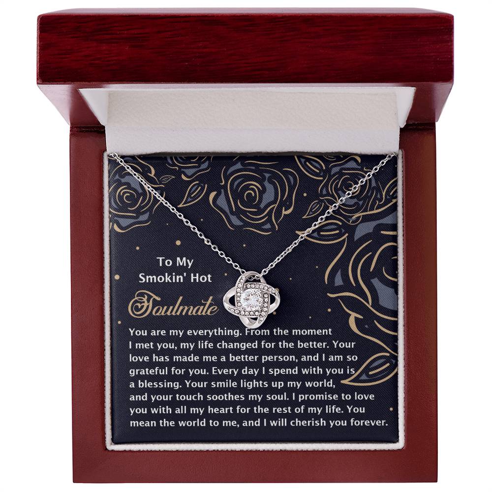 The Soulmate-My Soul 2 - Love Knot Necklace features cubic zirconia crystals and a planet charm, presented in an elegant red box. The inner lid is adorned with gold roses and carries a heartfelt message for your soulmate, making it a perfect personalized gift.