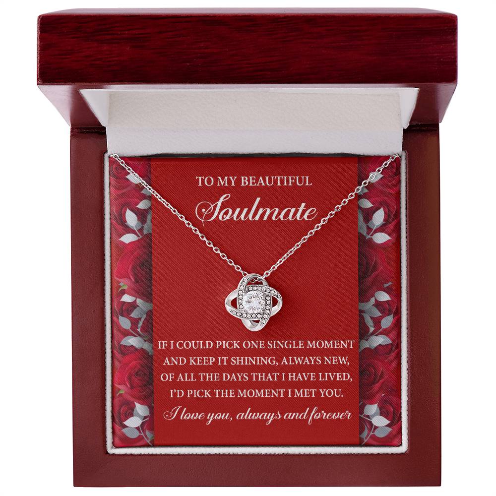 The Soulmate-Keep It Shining Love Knot Necklace features a planet pendant, cubic zirconia, and a stunning gold finish. Nestled in a rose-patterned box, it reads: "To my beautiful soulmate...I love you, always and forever," symbolizing eternal love.