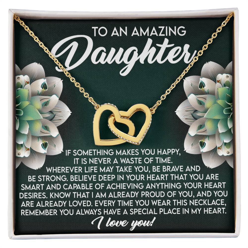 The Daughter-Special Place - Interlocking Hearts Necklace, featuring gold and cubic zirconia crystals, is elegantly presented on a floral card with a heartfelt message to a daughter, ending with "I love you!.