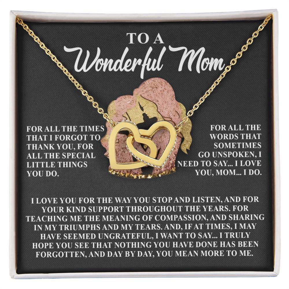 The Mom-More To Me Interlocking Hearts Necklace in rose gold is beautifully presented in a gift box. The lid says "To a Wonderful Mom" with a heartfelt message of gratitude and love for her support, compassion, and presence.