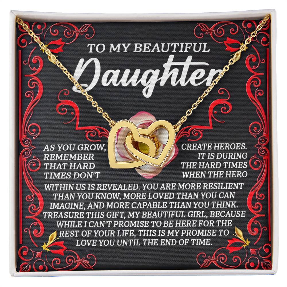 The Daughter-Hard Times Interlocking Hearts Necklace, with a rose gold finish, is elegantly presented in a decorative box featuring intricate red and gold designs. It includes a heartfelt message for a daughter, offering love and encouragement during challenging times.