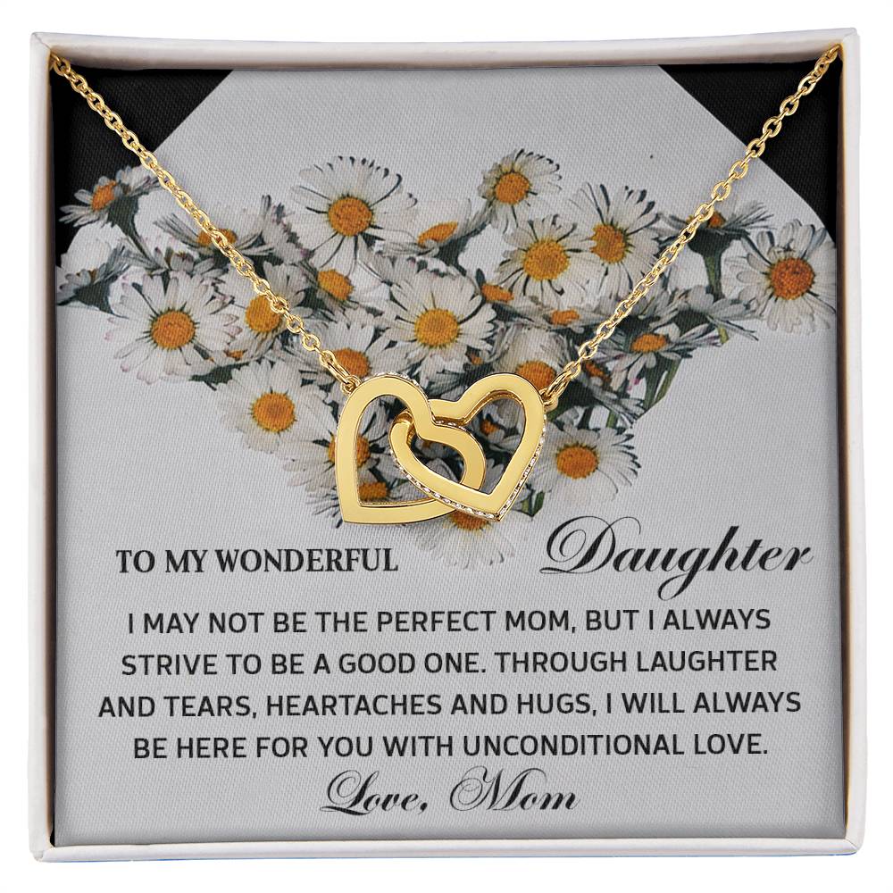 The Daughter-Unconditional Love - Interlocking Hearts Necklace is adorned with sparkling cubic zirconia crystals on a floral background and features a heartfelt message from mother to daughter.