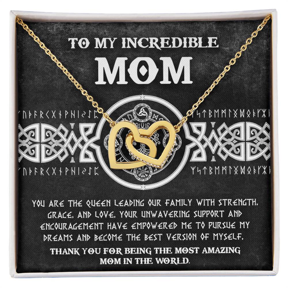 The "To Mom, The Queen 2 - Interlocking Hearts Necklace" features cubic zirconia crystals on a black and white card. This gold heart necklace showcases a Celtic design with a heartfelt message for "Mom.