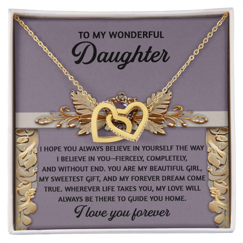The Daughter-Guide You Home - Interlocking Hearts Necklace features sparkling cubic zirconia crystals on a decorative card with gold detailing and a purple background, making it a perfect expression of love and support for your daughter.