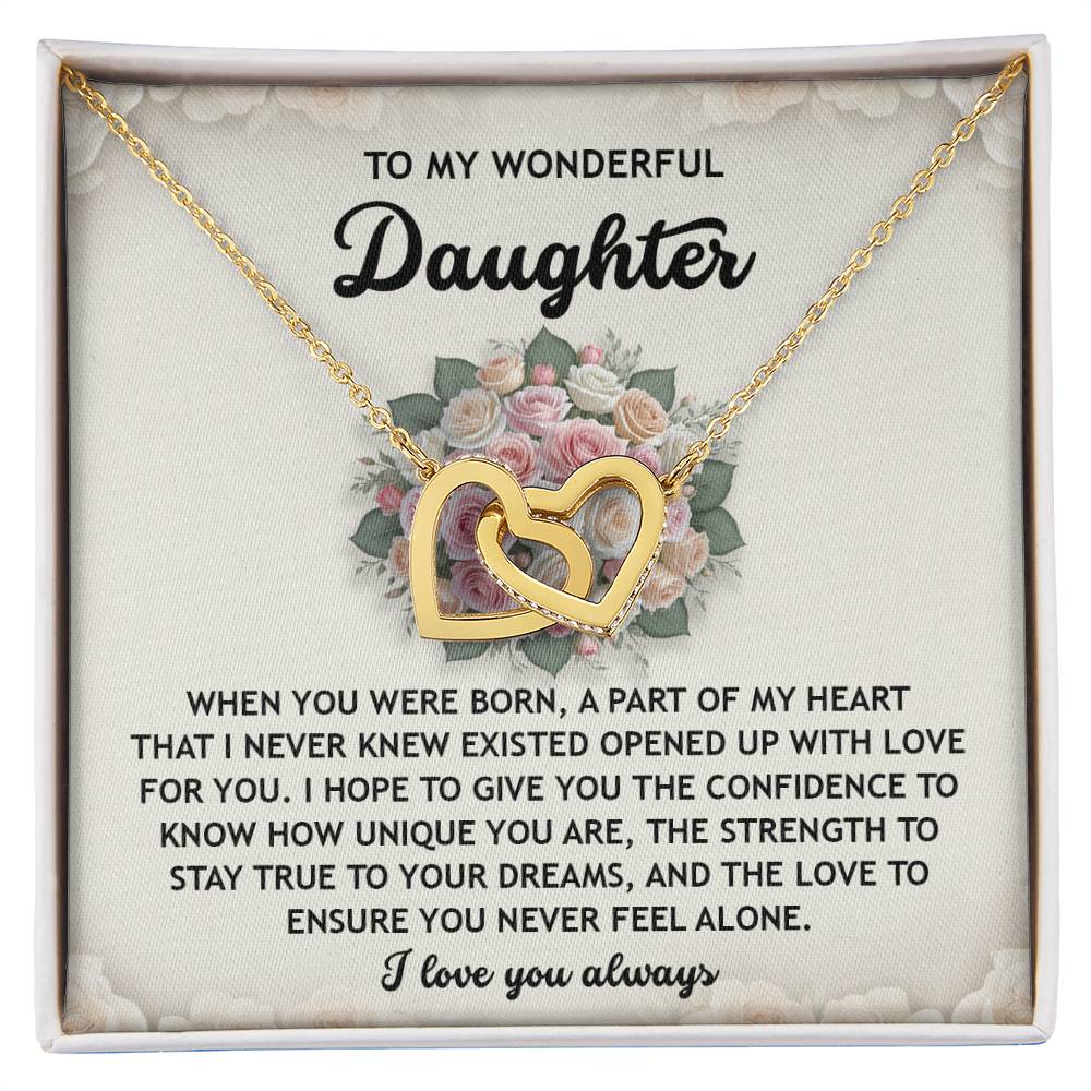 The Daughter-Stay True Interlocking Hearts Necklace features stunning cubic zirconia crystals and a floral background, elegantly packaged in a box with an inspirational message for your daughter.