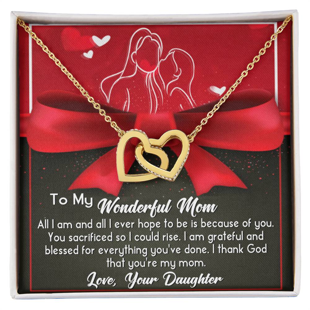 The "To Mom, Because Of You - Interlocking Hearts Necklace," featuring cubic zirconia crystals and a rose gold finish, beautifully expresses gratitude and love from daughter to mother.