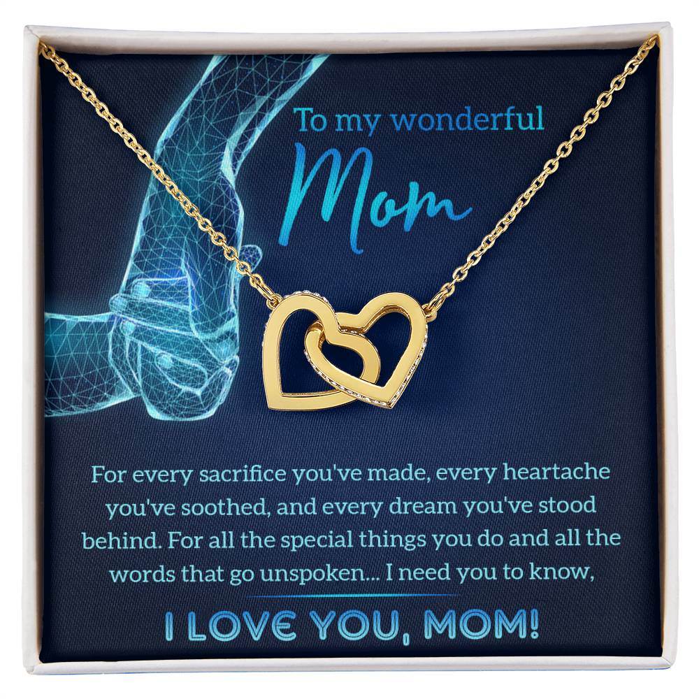The "To Mom, Stood Behind" Interlocking Hearts Necklace features a gold heart shape with cubic zirconia crystals and comes beautifully boxed with an appreciation message. Celebrate her sacrifices and love with this personalized gift that captures your heartfelt gratitude and affection.