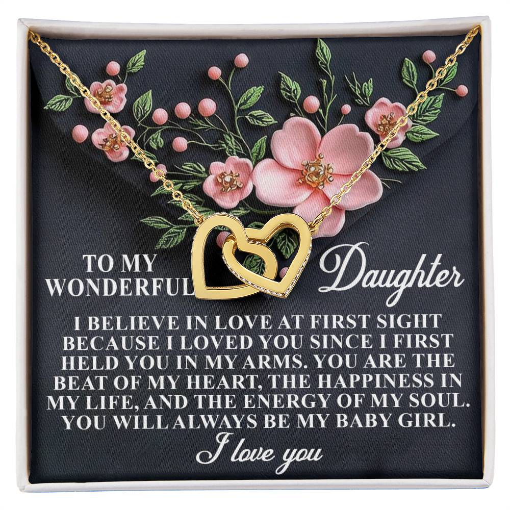 The "Daughter-Love Sight - Interlocking Hearts Necklace," featuring cubic zirconia crystals on a rose gold finish chain, is displayed against a black background with pink flowers. It conveys a heartfelt message to a daughter, embracing cherished memories and ending with "I love you.