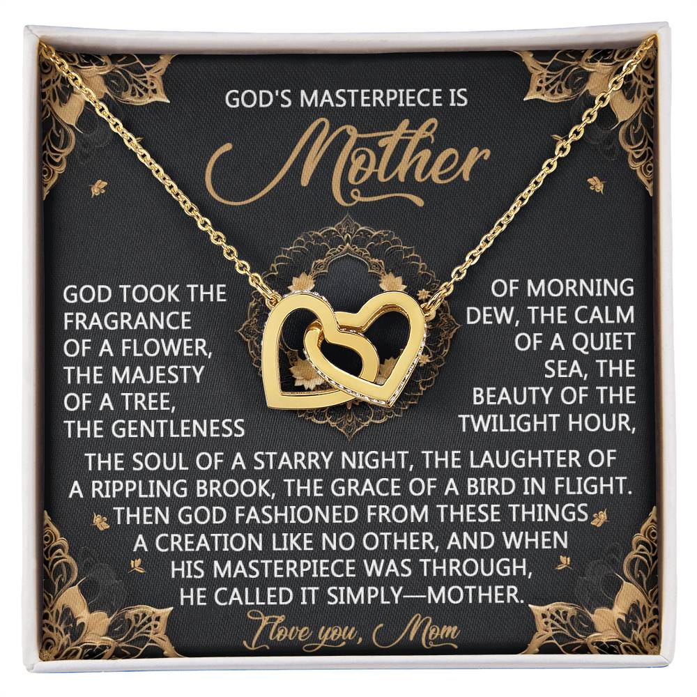 The Mom-God's Masterpiece necklace, with rose gold interlocking hearts and cubic zirconia crystals, rests on a card featuring a mother's poem. An ornate golden floral backdrop elegantly enhances the words "I Love You, Mom.