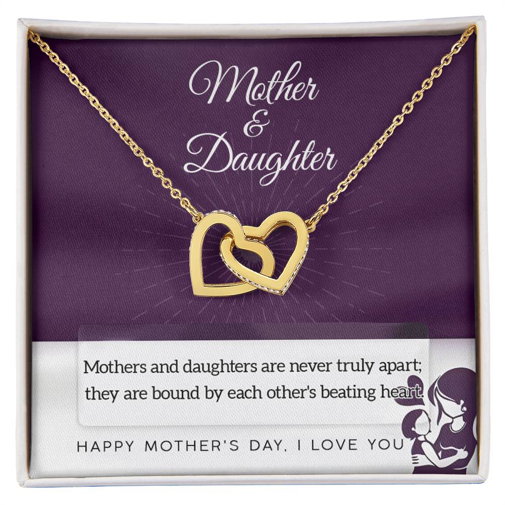 The Mother & Daughter-Never Truly Apart - Interlocking Hearts Necklace, embellished with cubic zirconia, is presented in a gift box that reads "Mother & Daughter" and features a heartfelt quote, Mother's Day message, and bond illustration.