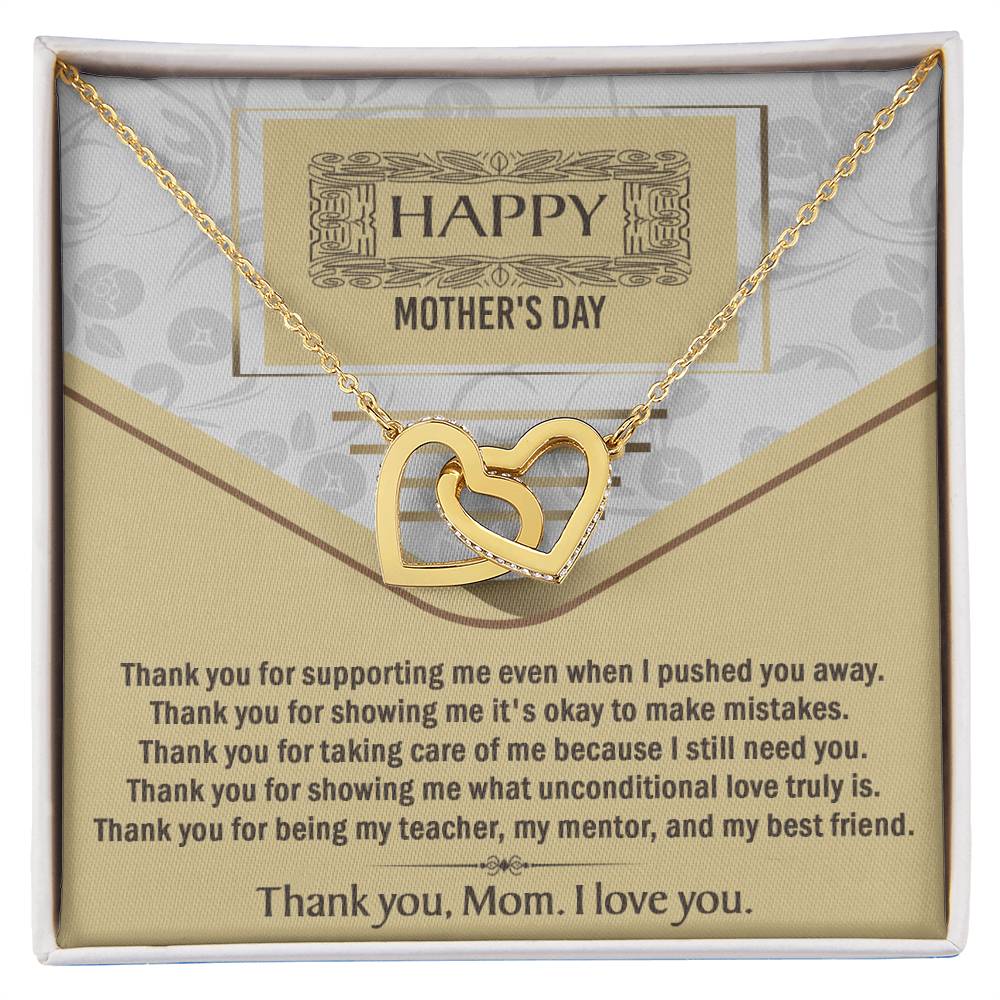 The Mother's Day-Thank You - Interlocking Hearts Necklace features sparkling cubic zirconia crystals in a gold design, displayed in a gift box with a “Happy Mother’s Day” background and a loving thank-you message for Mom.