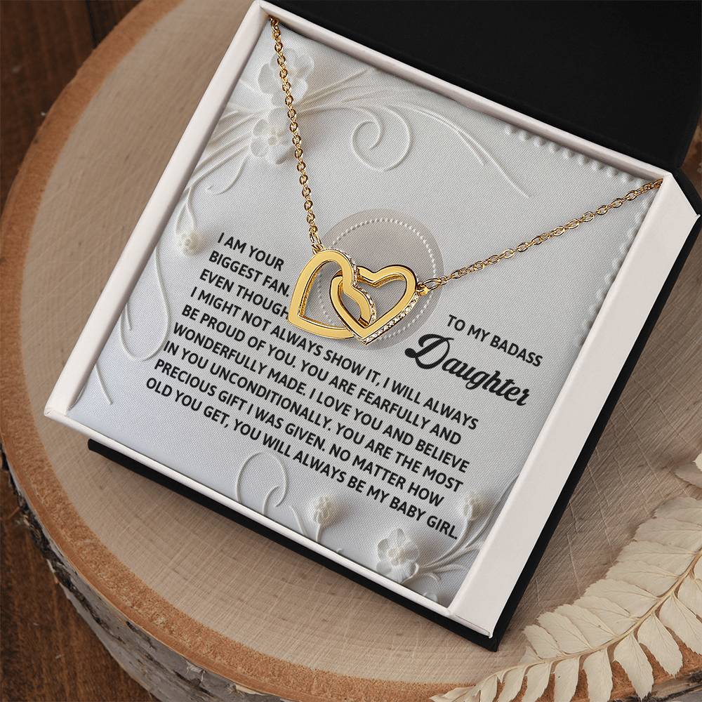 The Daughter-My Baby Girl - Interlocking Hearts Necklace with a rose gold finish is showcased above a heartfelt message to a daughter in a gift box.