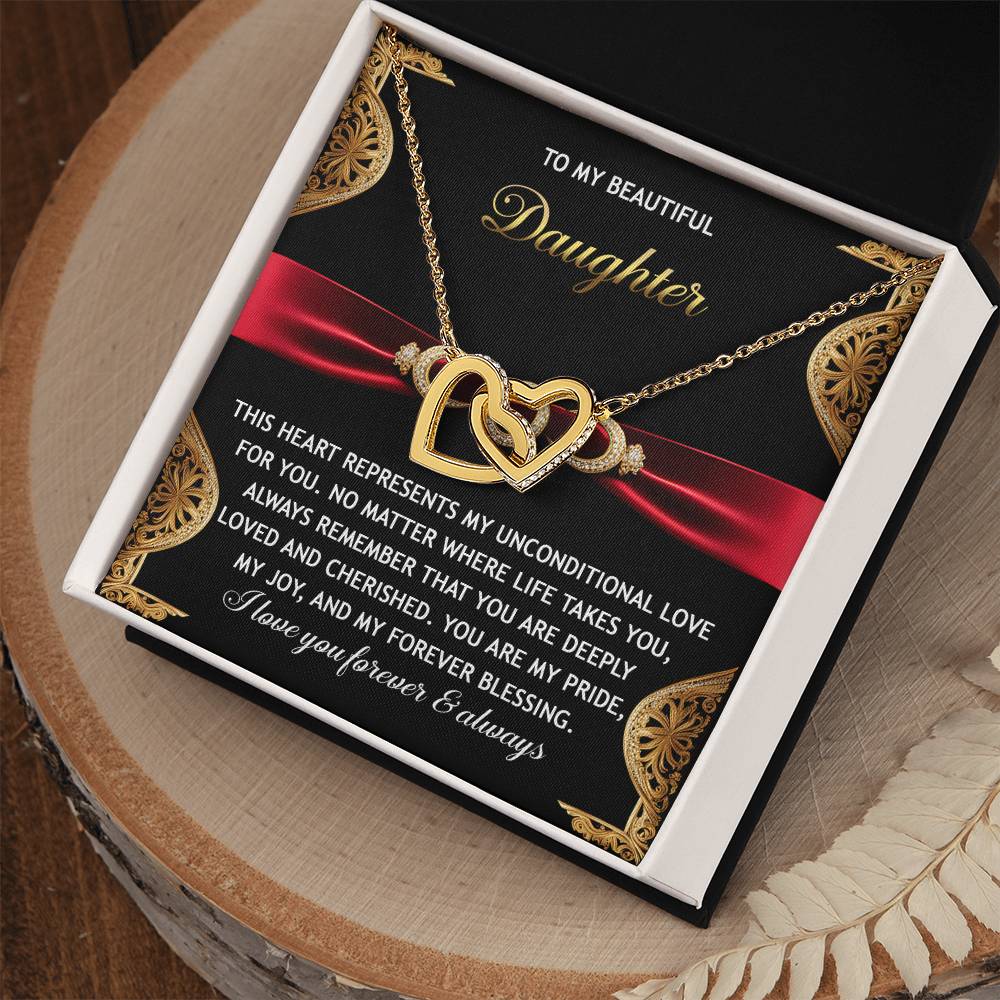 The Daughter-Love For You - Interlocking Hearts Necklace, adorned with cubic zirconia crystals, comes on a stylish red and black card. It features the heartfelt message "To My Beautiful Daughter," embodying elegance and unconditional love.