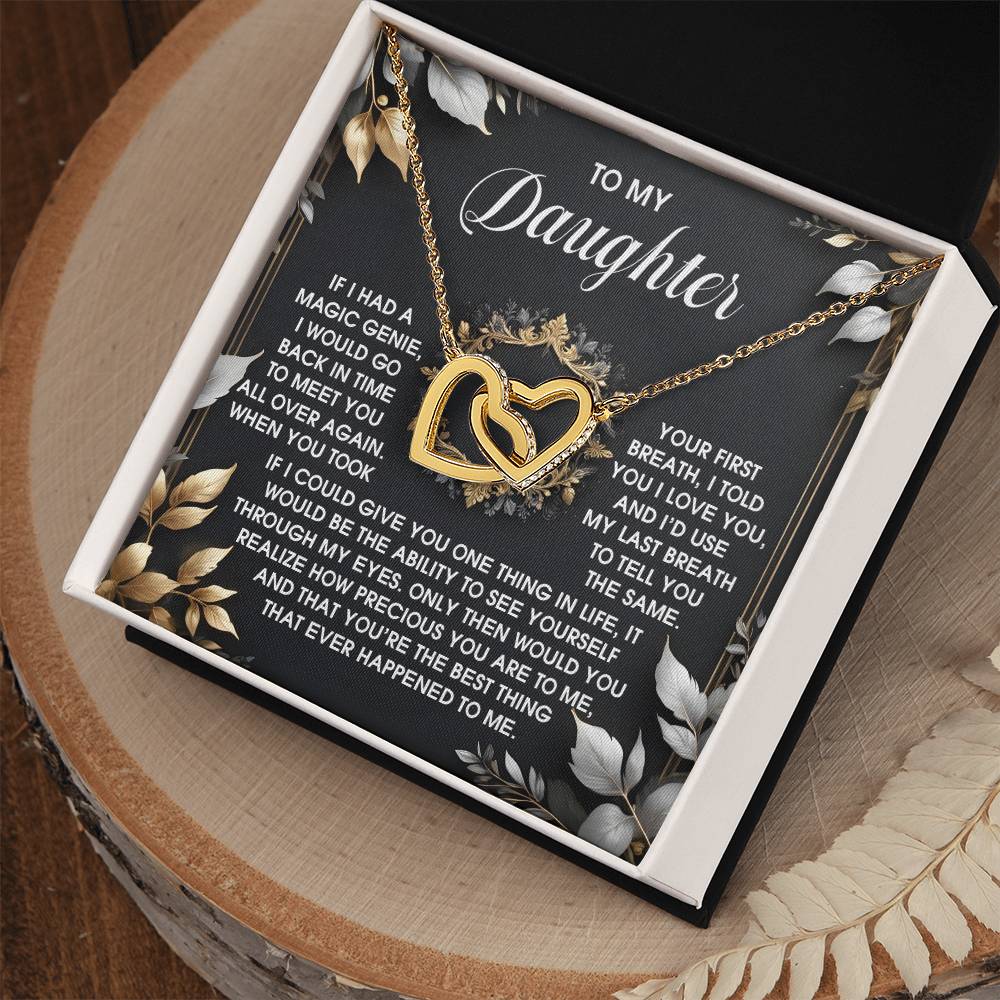 The Daughter-Over Again Interlocking Hearts Necklace features a rose gold finish and comes in a black box with floral design, complete with a heartfelt message for your daughter.
