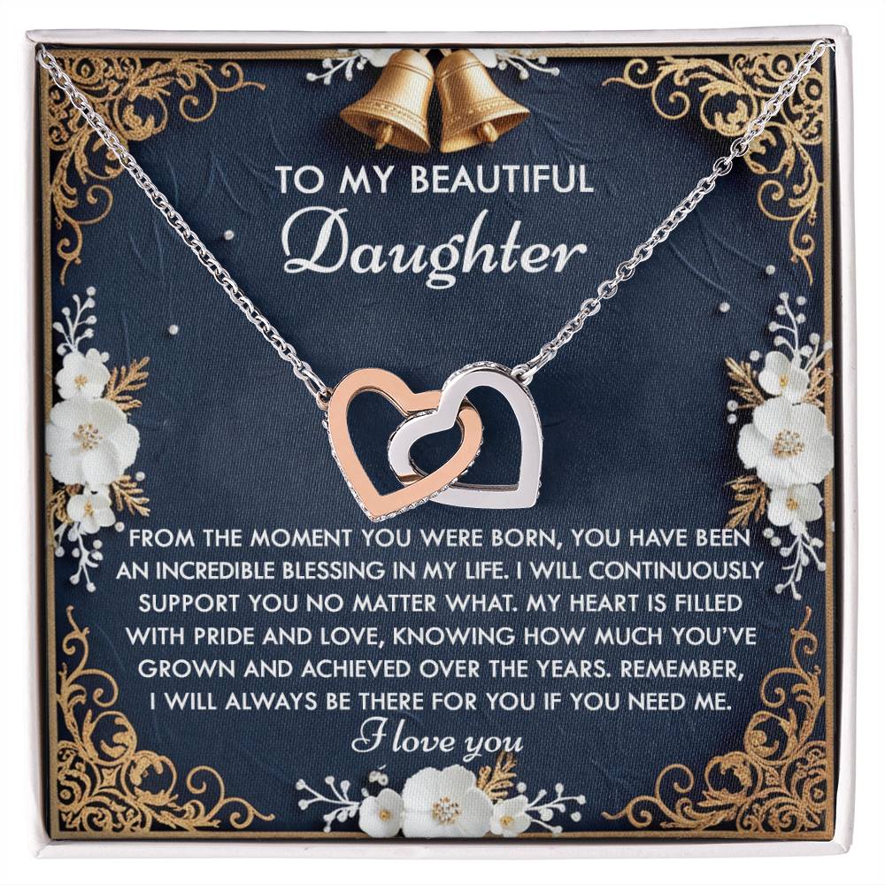 The Daughter-If You Interlocking Hearts Necklace features cubic zirconia crystals and comes with a heartfelt card that reads: "To my beautiful daughter," offering love and support.