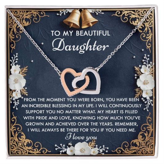 The Daughter-If You Interlocking Hearts Necklace features cubic zirconia crystals and comes with a heartfelt card that reads: "To my beautiful daughter," offering love and support.