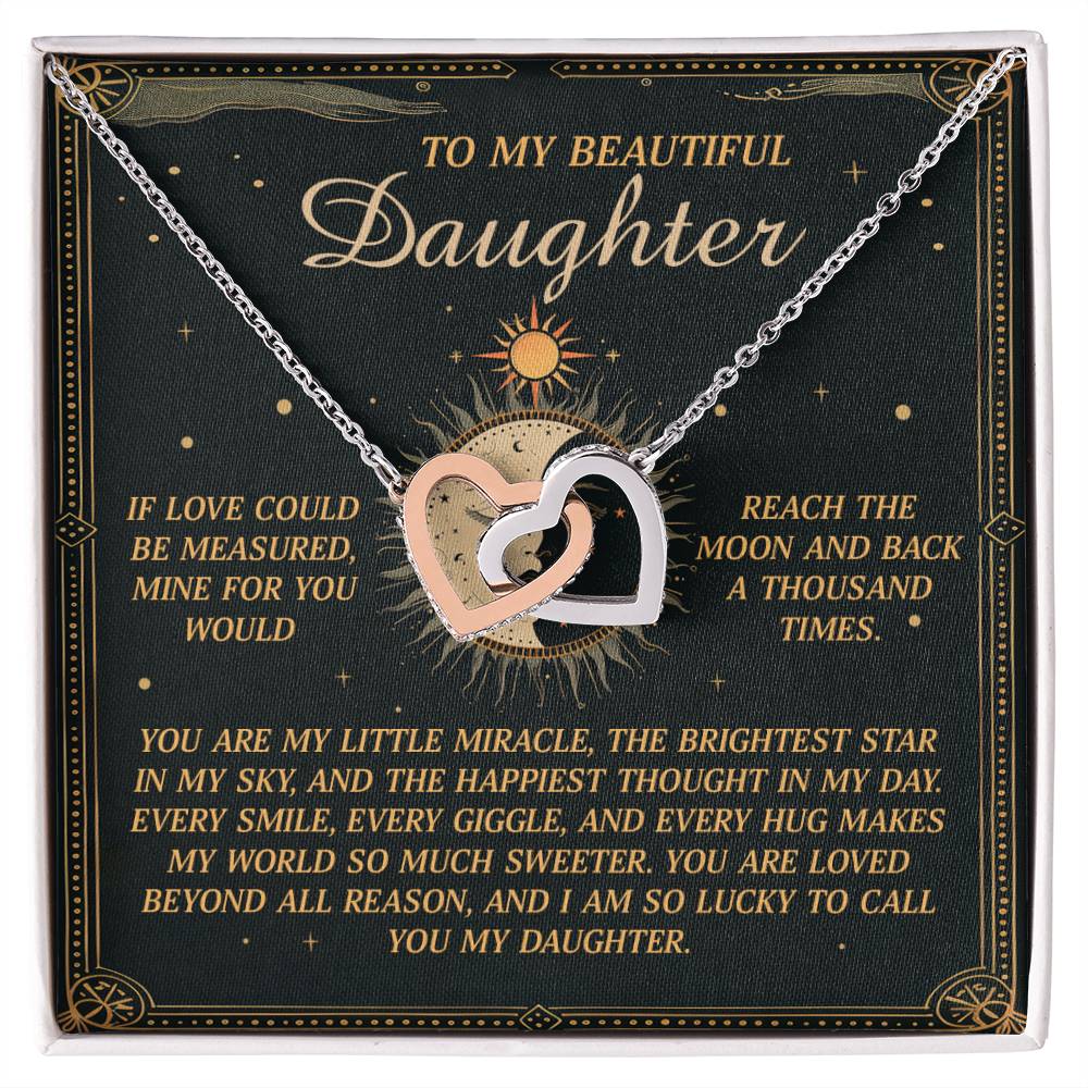 The Daughter-To Call You - Interlocking Hearts Necklace with cubic zirconia crystals comes on a green card featuring a sun design and heartfelt text expressing love to a daughter, mentioning the moon and stars.