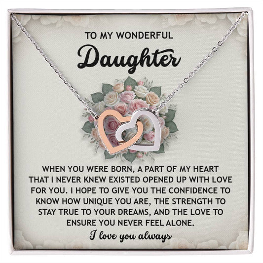 The Daughter-Stay True Interlocking Hearts Necklace features silver and rose gold hearts with cubic zirconia crystals on a floral card, offering love and encouragement to a daughter.