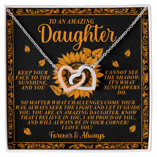 Discover the "Daughter-Seek Light - Interlocking Hearts Necklace," featuring cubic zirconia crystals on a sunflower-themed card with the message: "To an amazing daughter...No matter what challenges come your way, always seek the light...I love you! Forever & Always." An ideal gift to cherish.