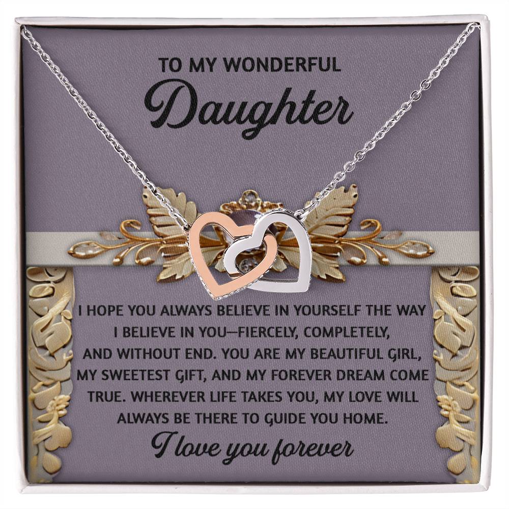 The Daughter-Guide You Home - Interlocking Hearts Necklace features an elegant rose gold finish, expressing belief, pride, love, and lifelong support on a heartfelt card adorned with shimmering cubic zirconia crystals against a gold leaf backdrop.