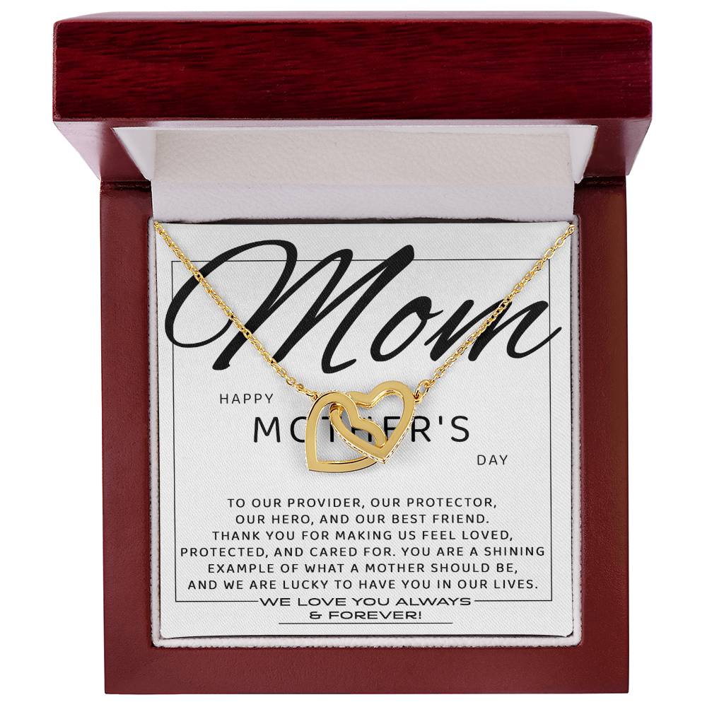 The "To Mom, Our Best Friend - Interlocking Hearts Necklace" is adorned with cubic zirconia crystals and comes in a red gift box. It features a "Mom, Happy Mother's Day" message, making it the perfect personalized gift to cherish forever.